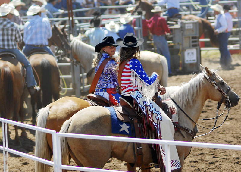 Two Women on Horses — Brown