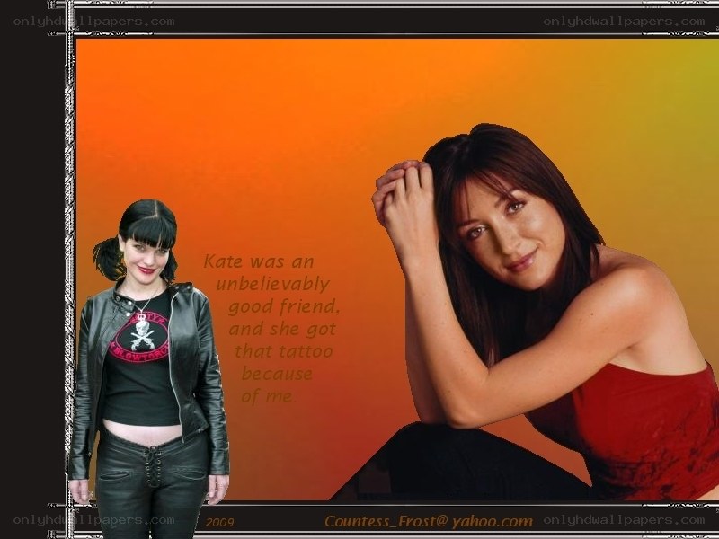 two women on orange background