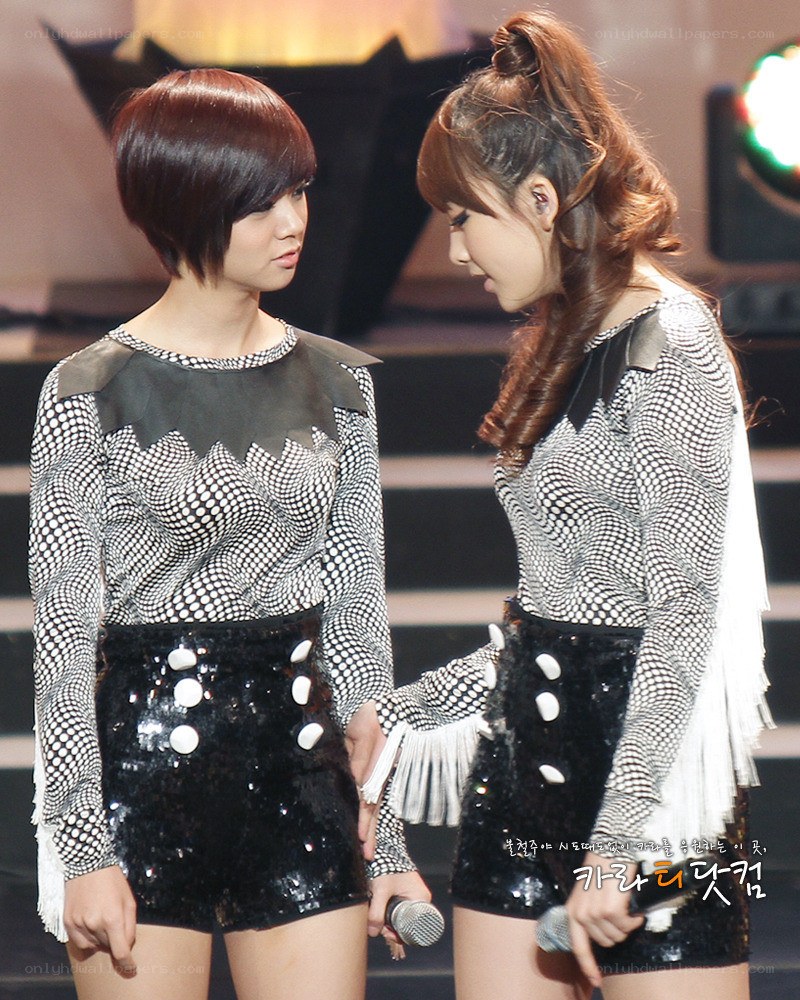 Two women on stage performing