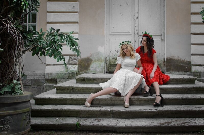 Two Women on Steps — White
