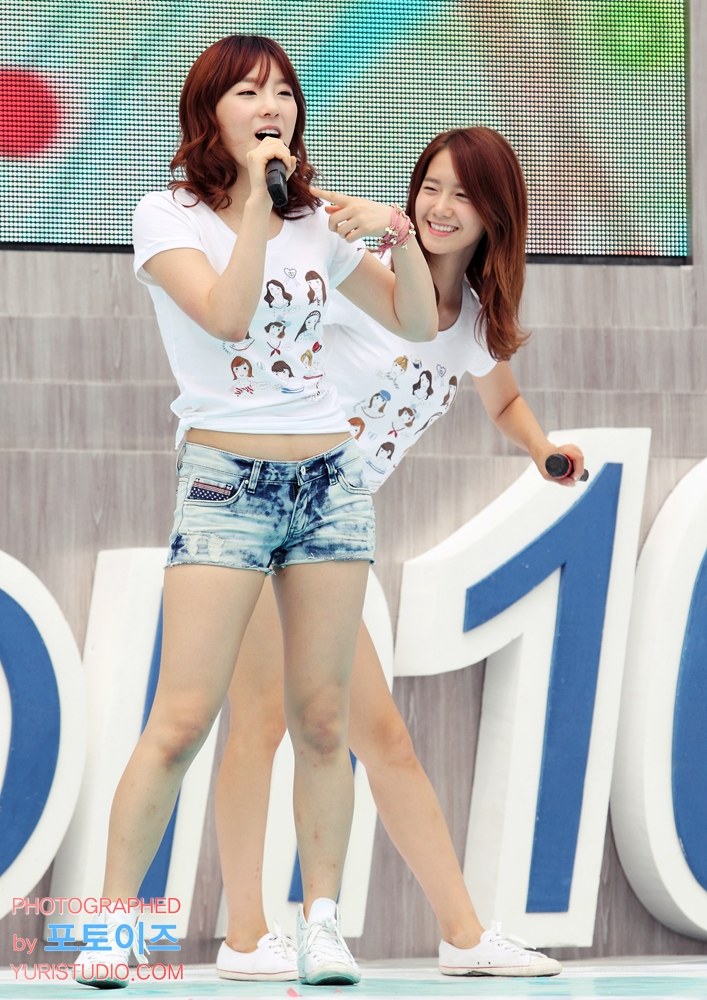 Two women performing on stage