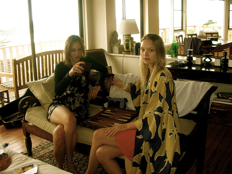 Two women playing backgammon