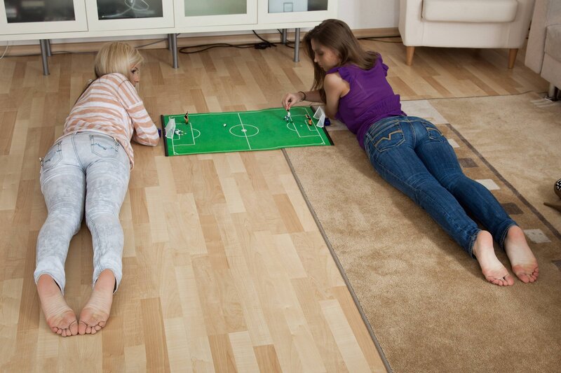 Two Women Playing Soccer Game