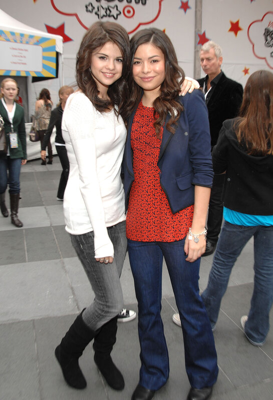 Two women posing at an event
