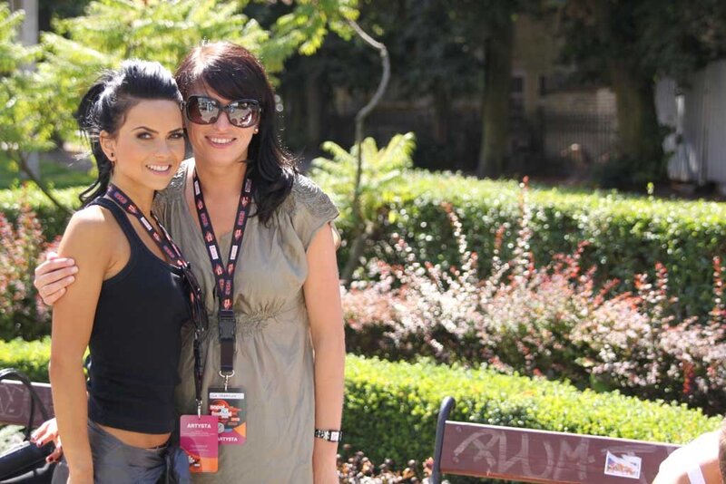 Two women posing in a park