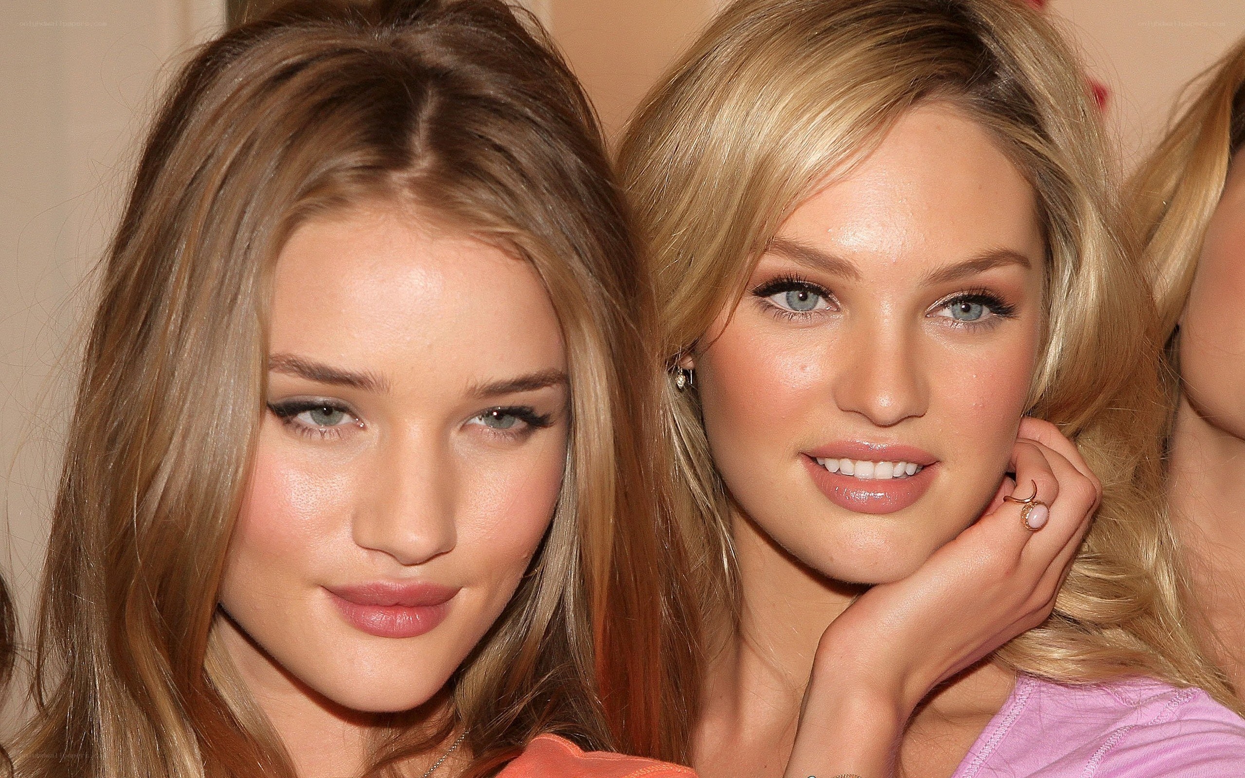 two women posing together