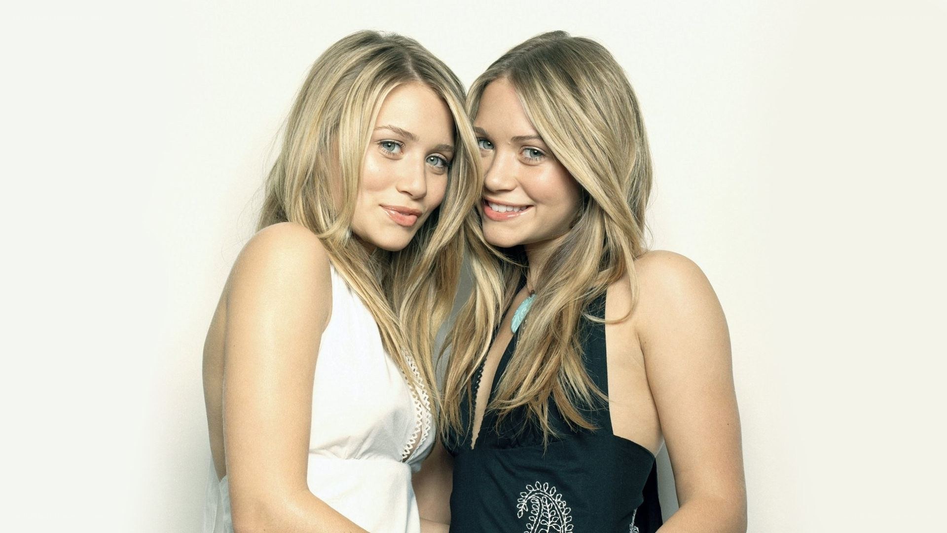 two women posing together