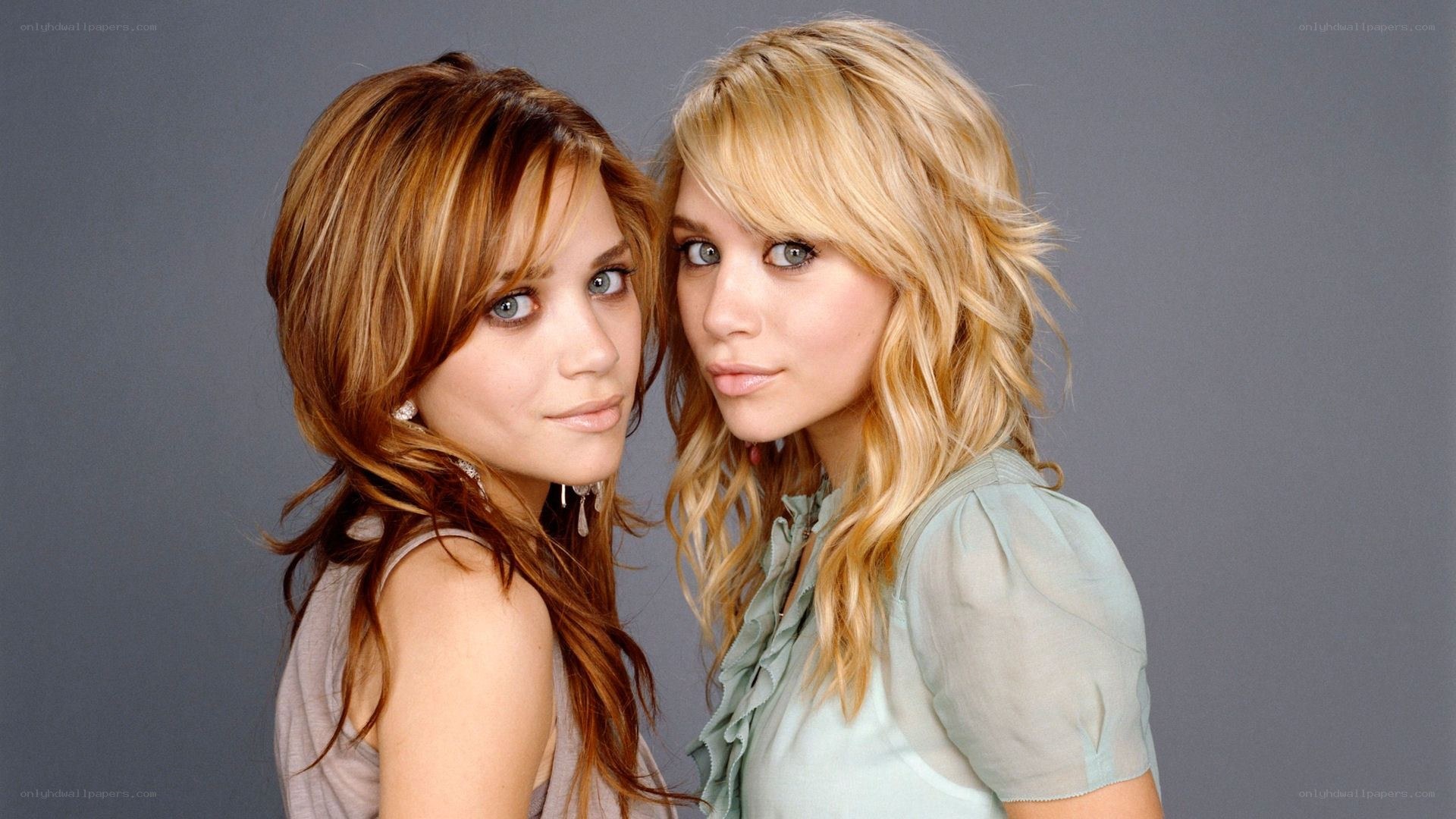 two women posing together