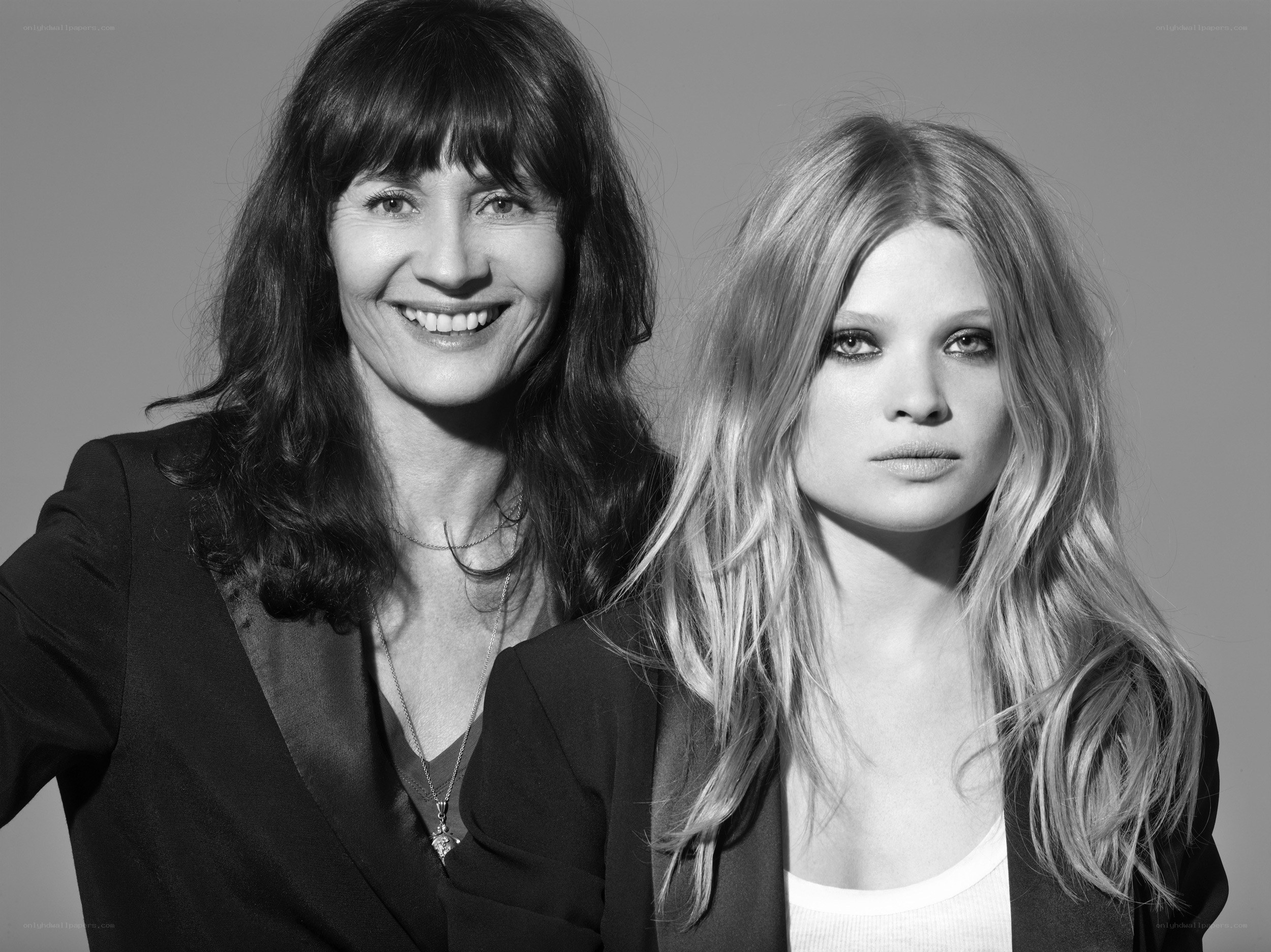 two women posing together