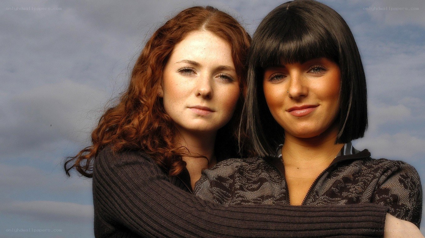 two women posing together