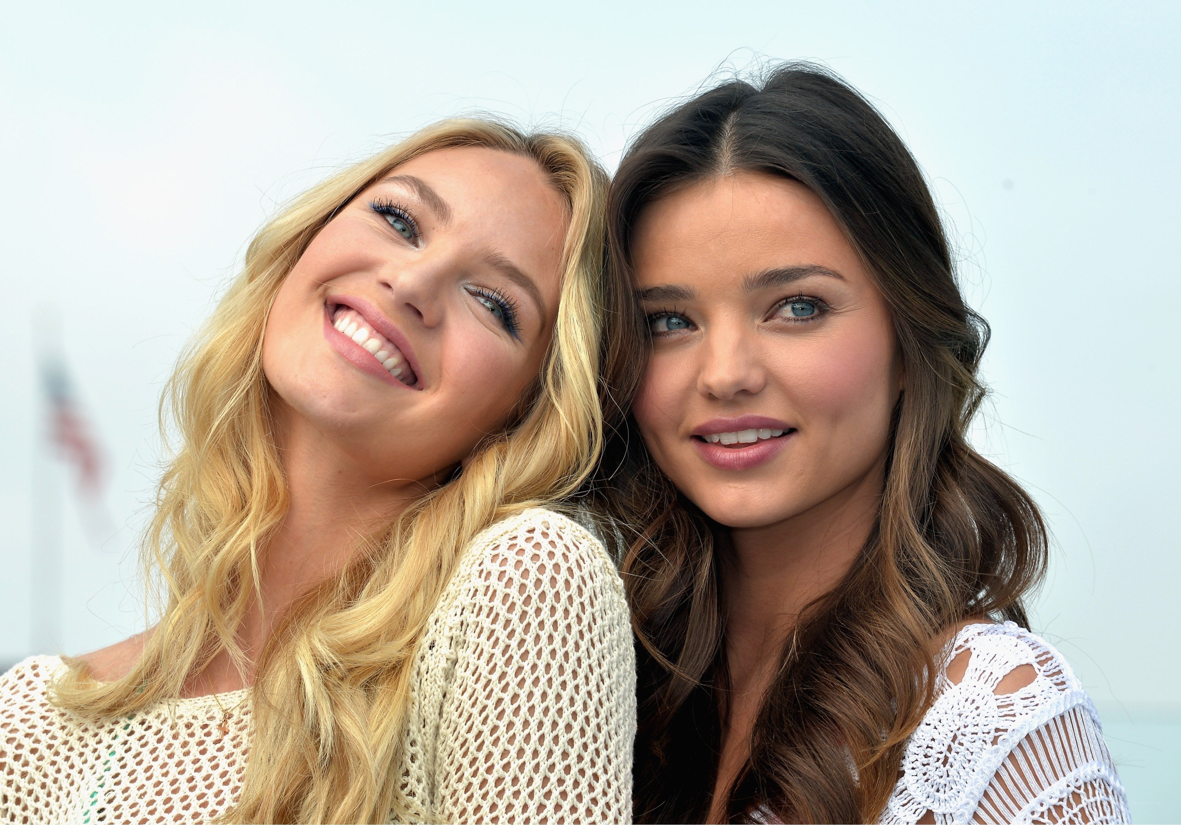 two women posing together