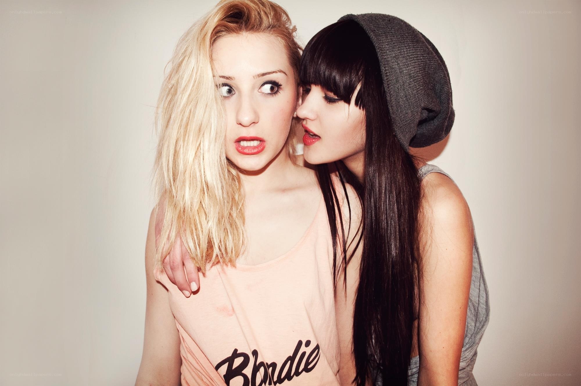 two women posing together