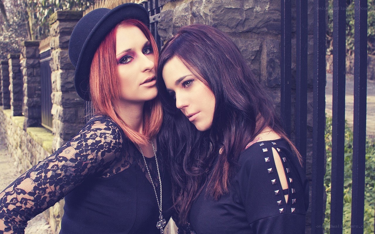 two women posing together