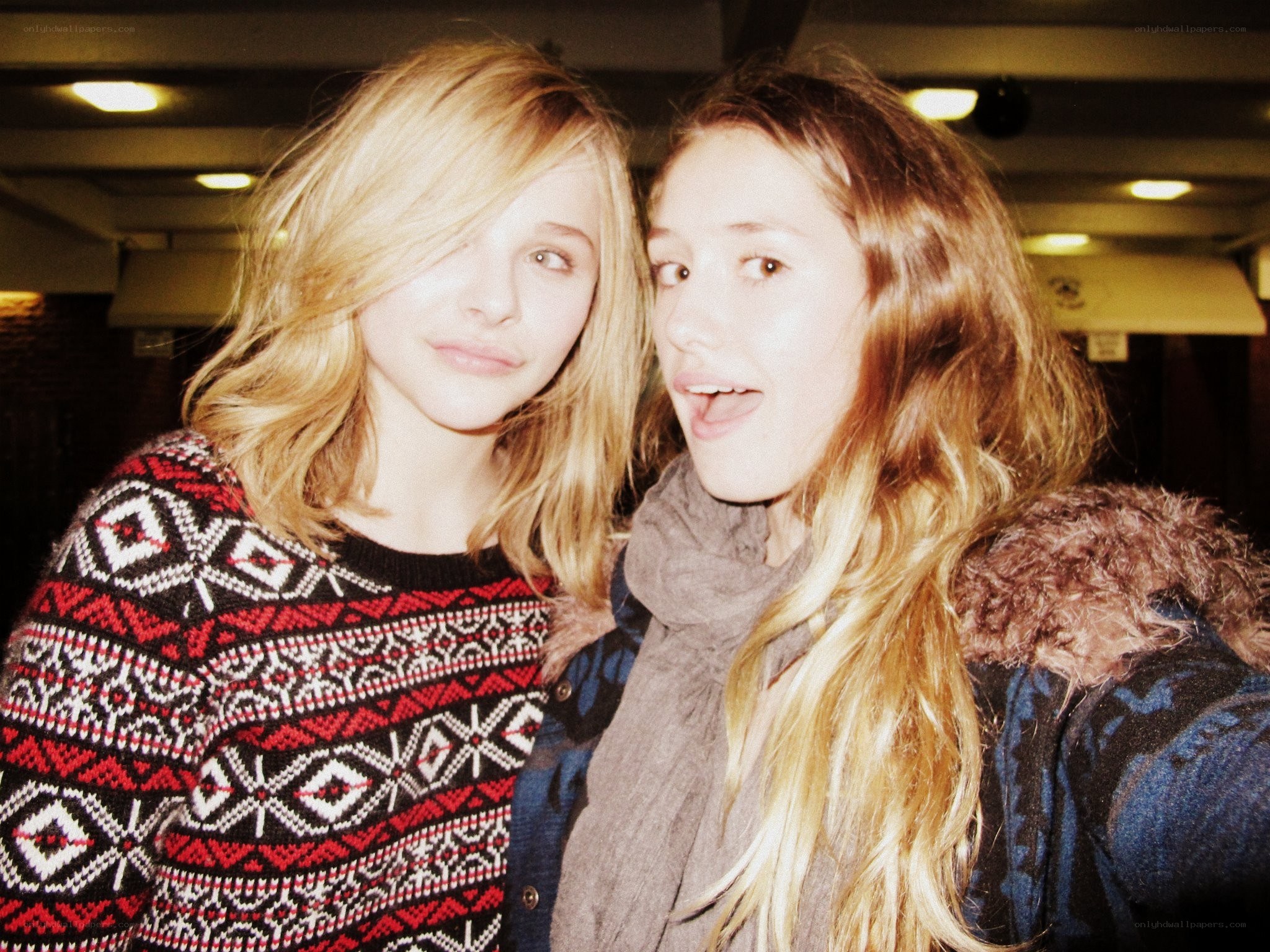 two women posing together