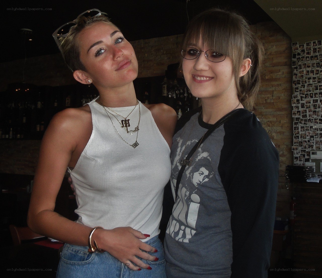 two women posing together