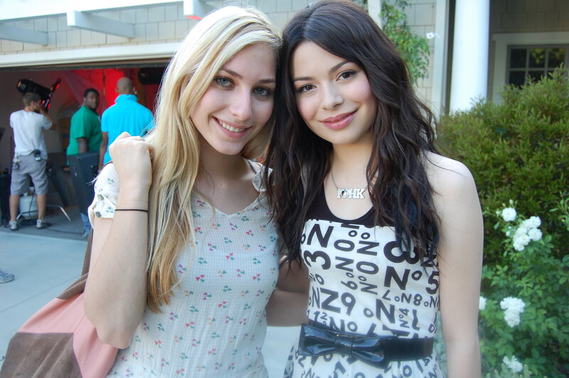 two women posing together