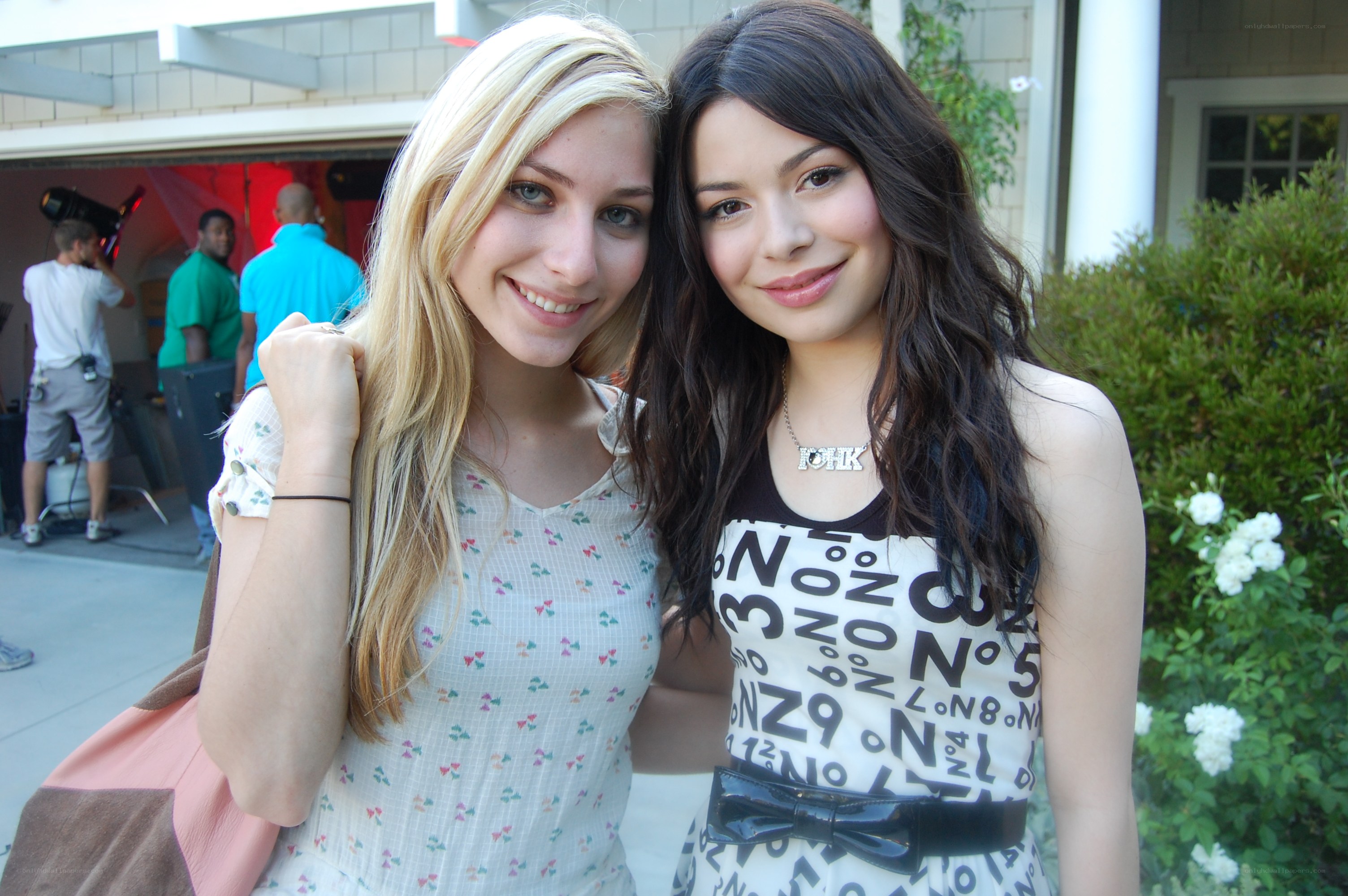 two women posing together