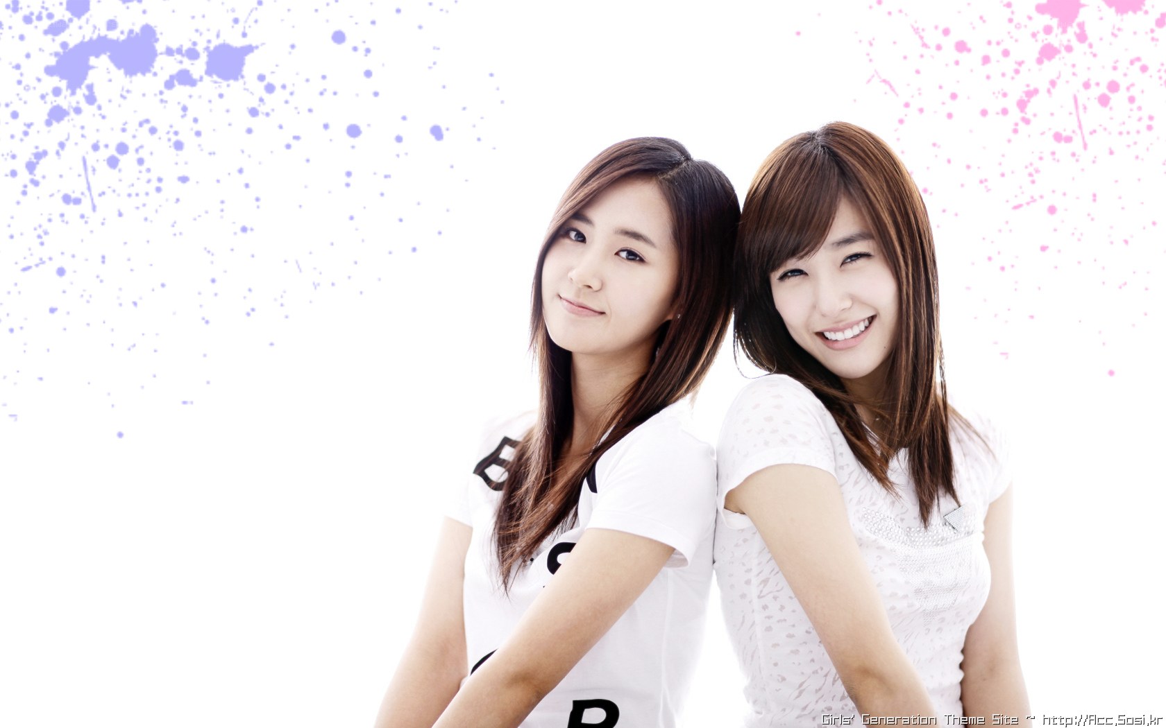 two women posing together