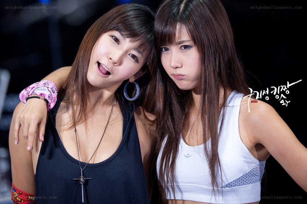 two women posing together