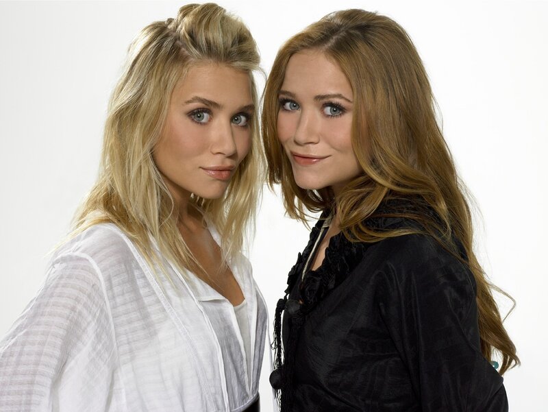 two women posing together
