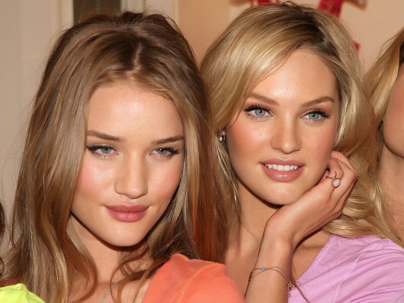 two women posing together