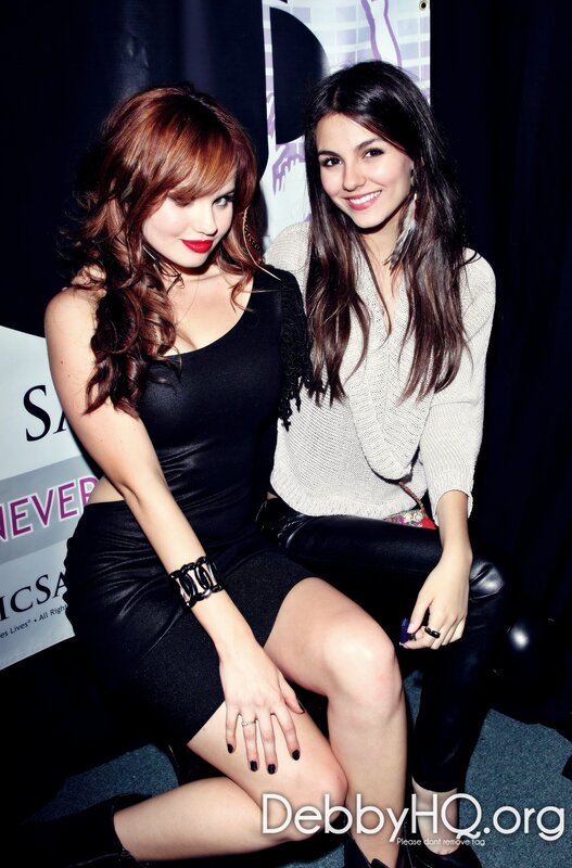 two women posing together