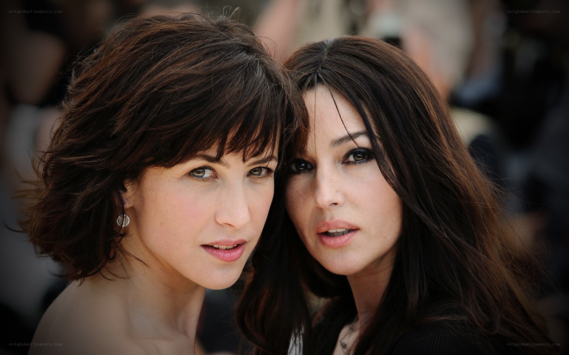 two women posing together