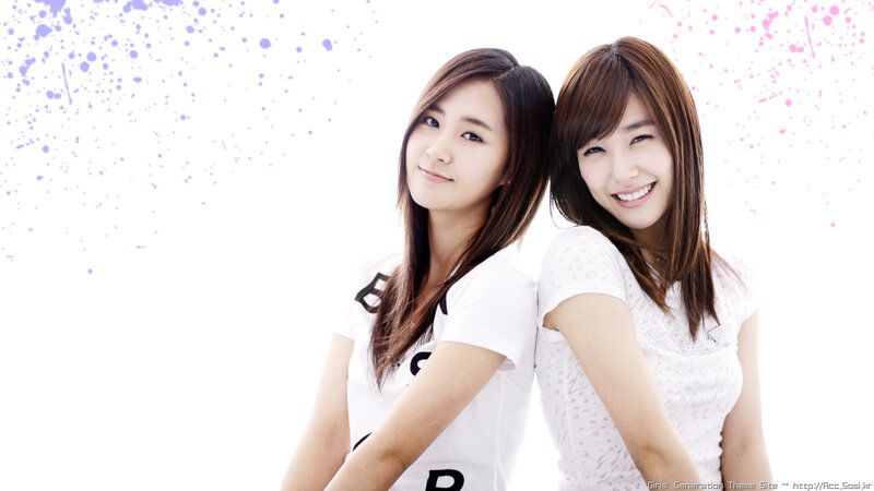 two women posing together