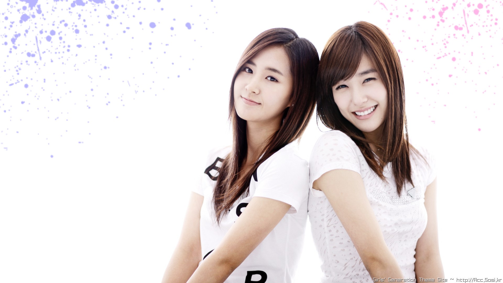 two women posing together