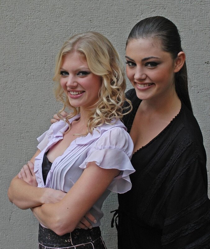 two women posing together