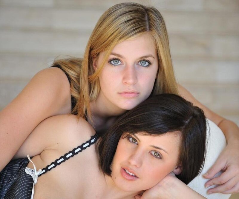 Two Women Posing Together — White