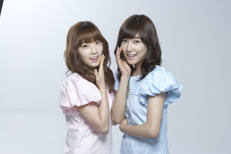 Two Women Posing — White, Cheerful