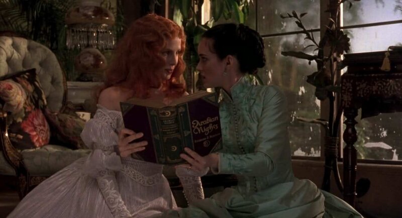Two Women Reading Book