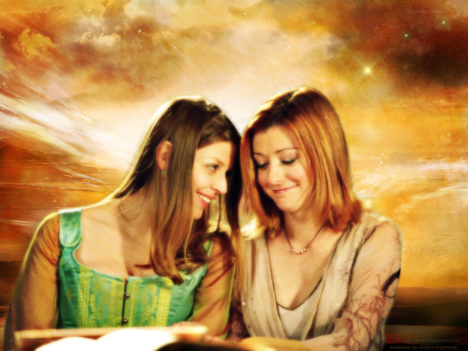 two women reading together