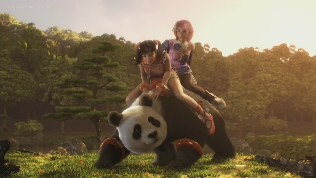 Two women riding a panda