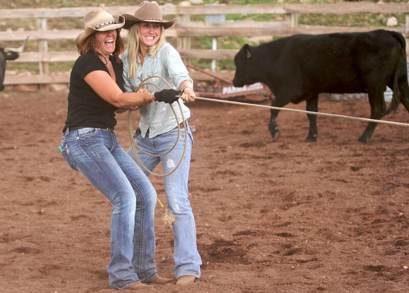 Two Women Roping a Bull