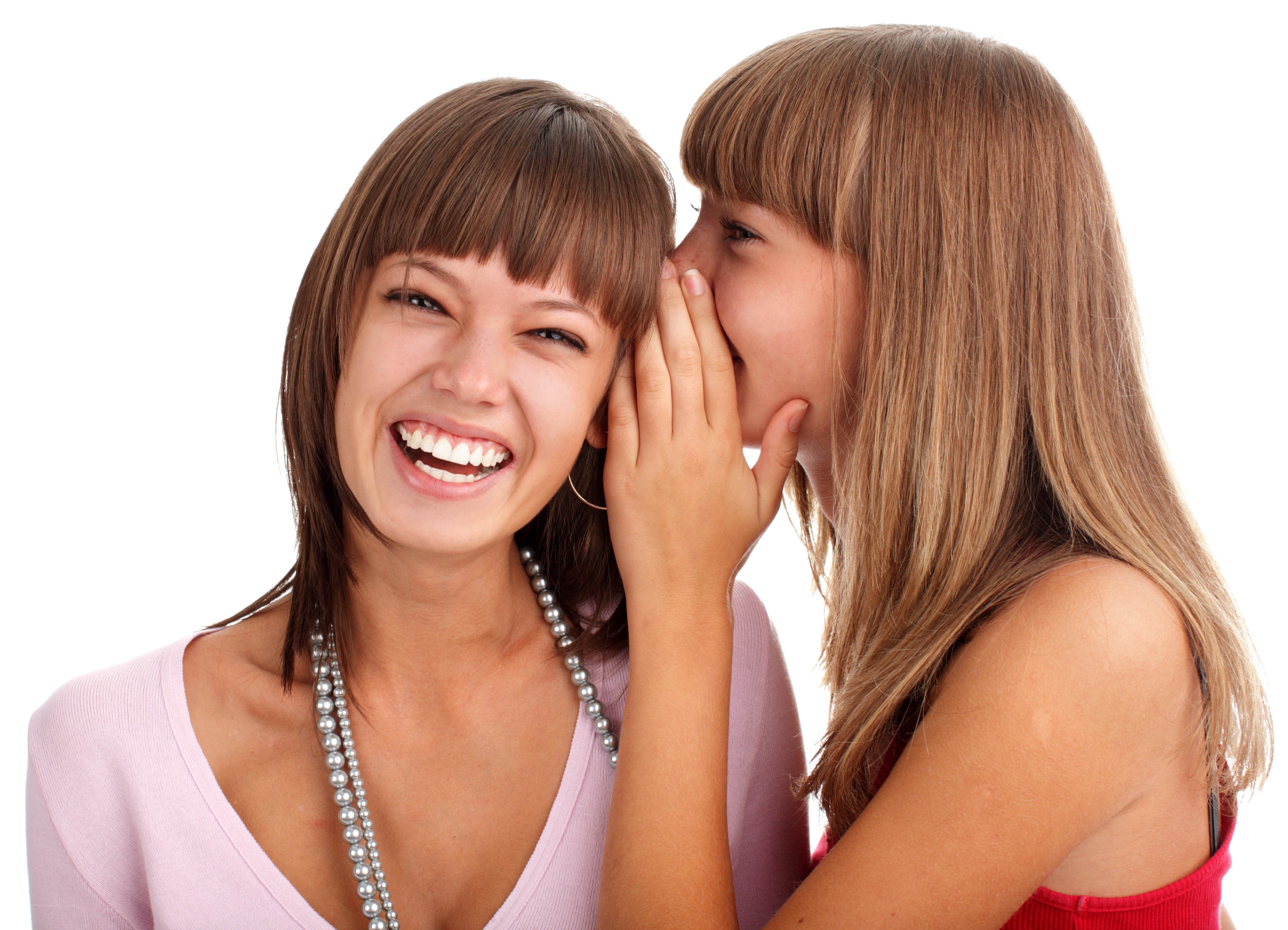 two women sharing a secret