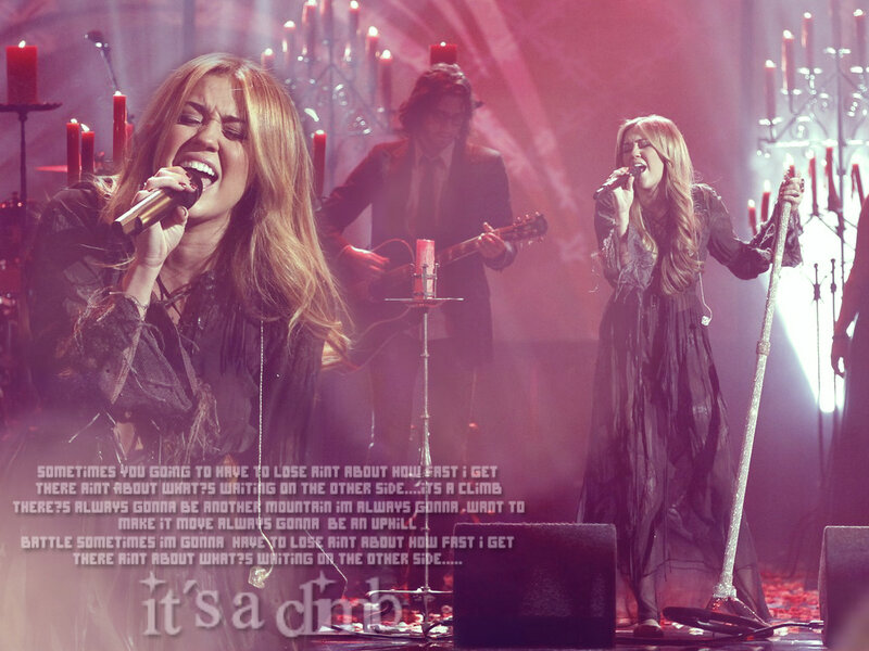 Two Women Singing on Stage — Red