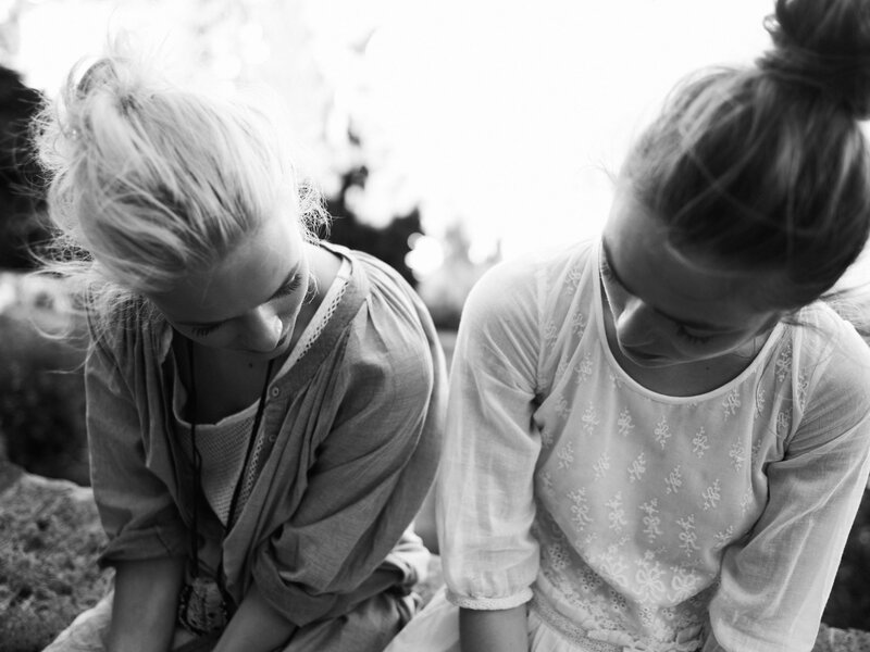 Two Women Sitting — Black, Calm, Afternoon
