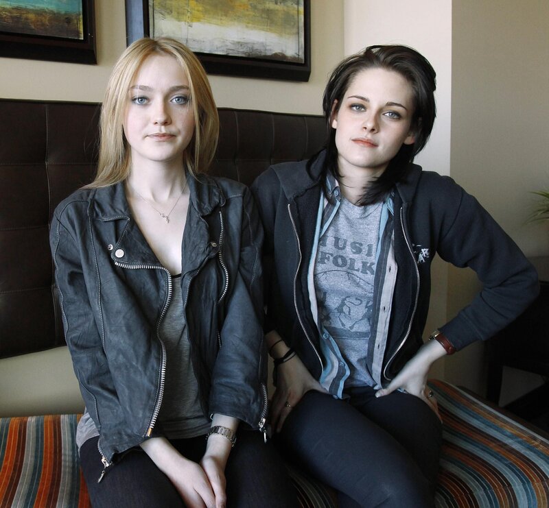 Two women sitting on a couch