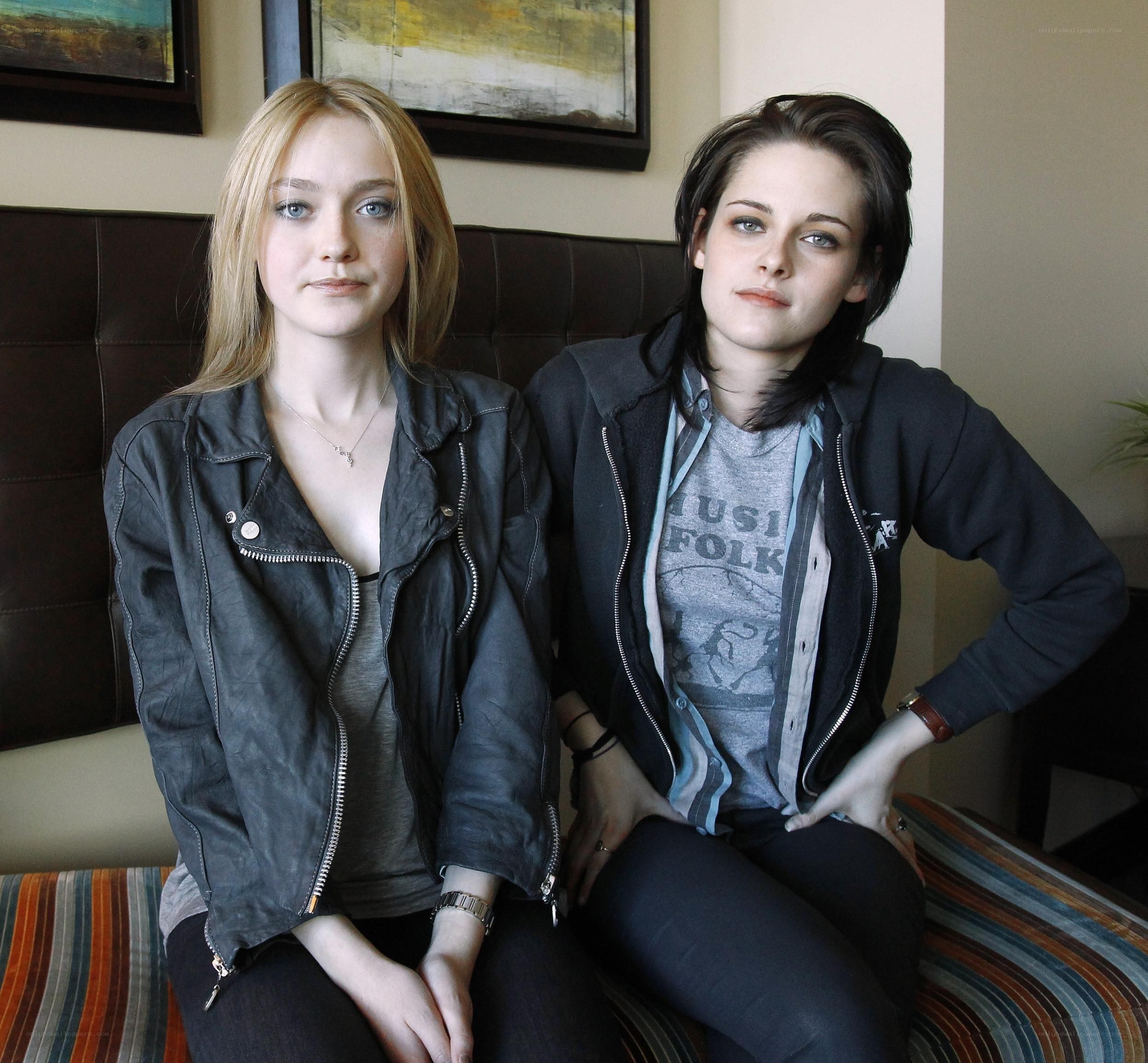 Two women sitting on a couch