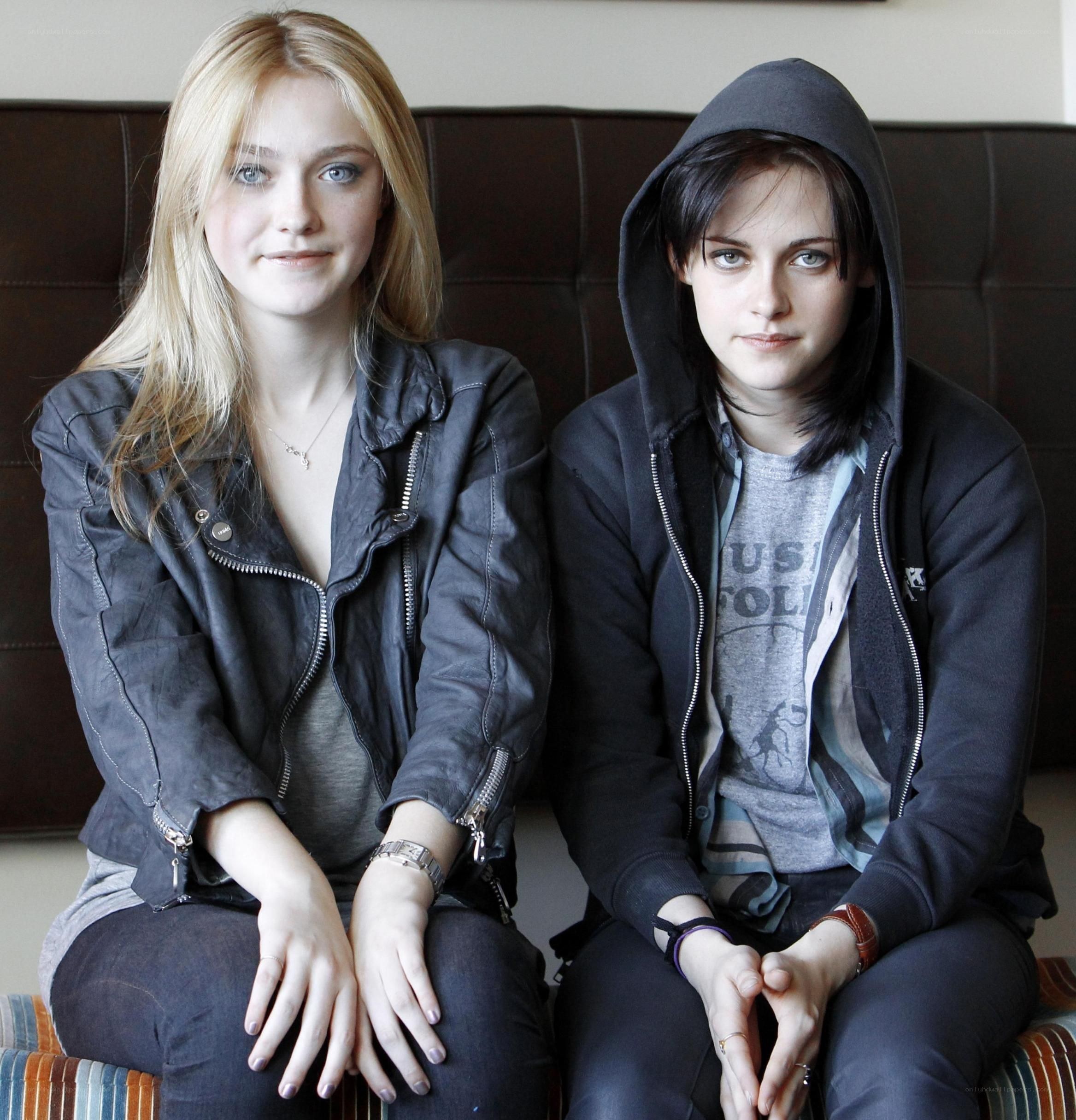 Two women sitting on a couch