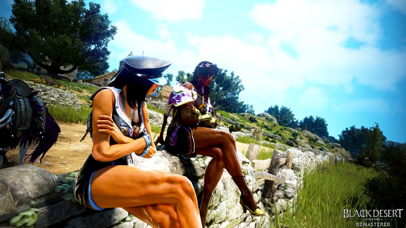 Two Women Sitting on Rocks