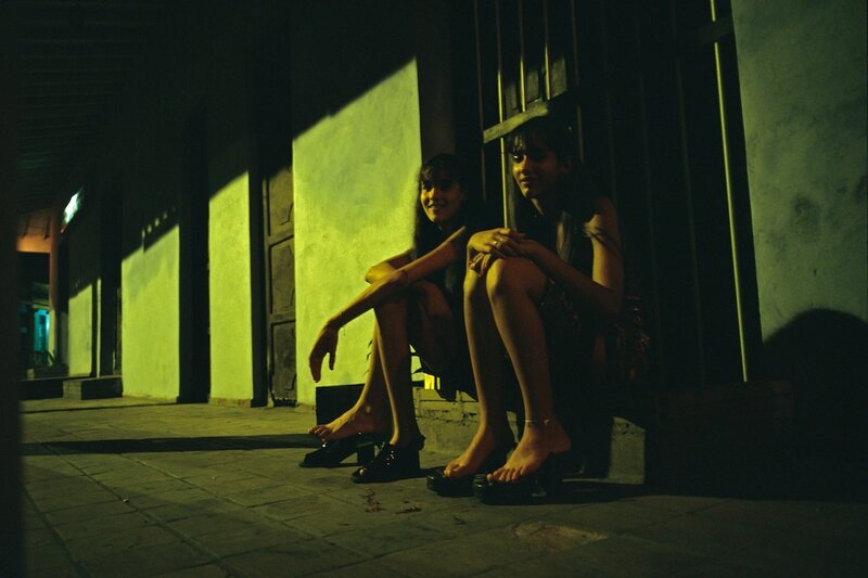 Two Women Sitting on Steps — Green