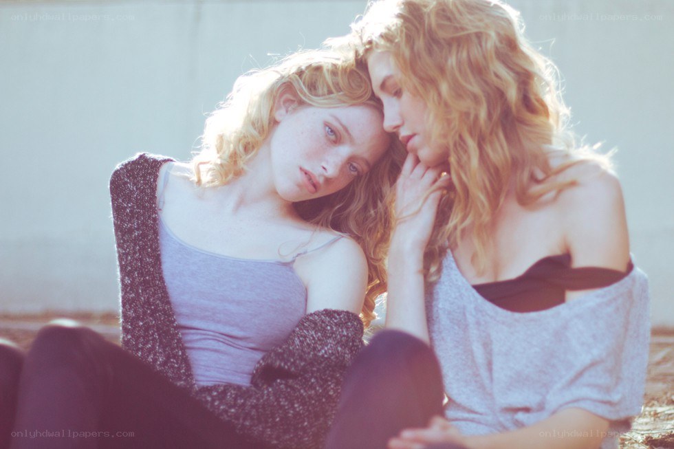 two women sitting together