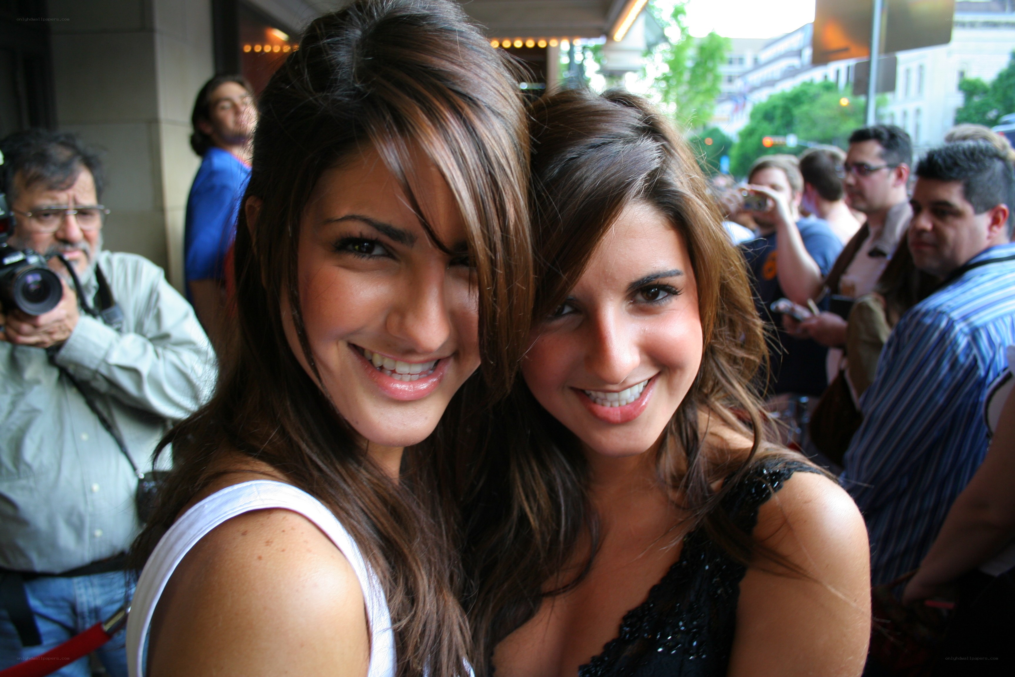 Two women smiling at event