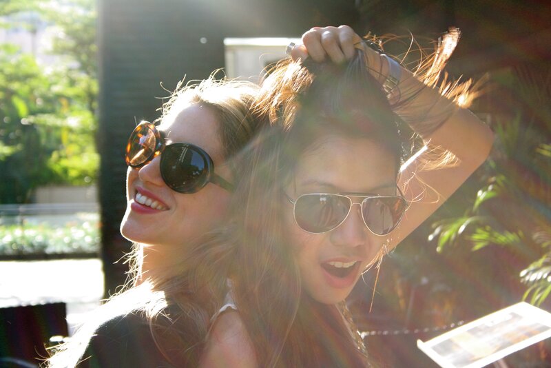 Two women smiling in the sun