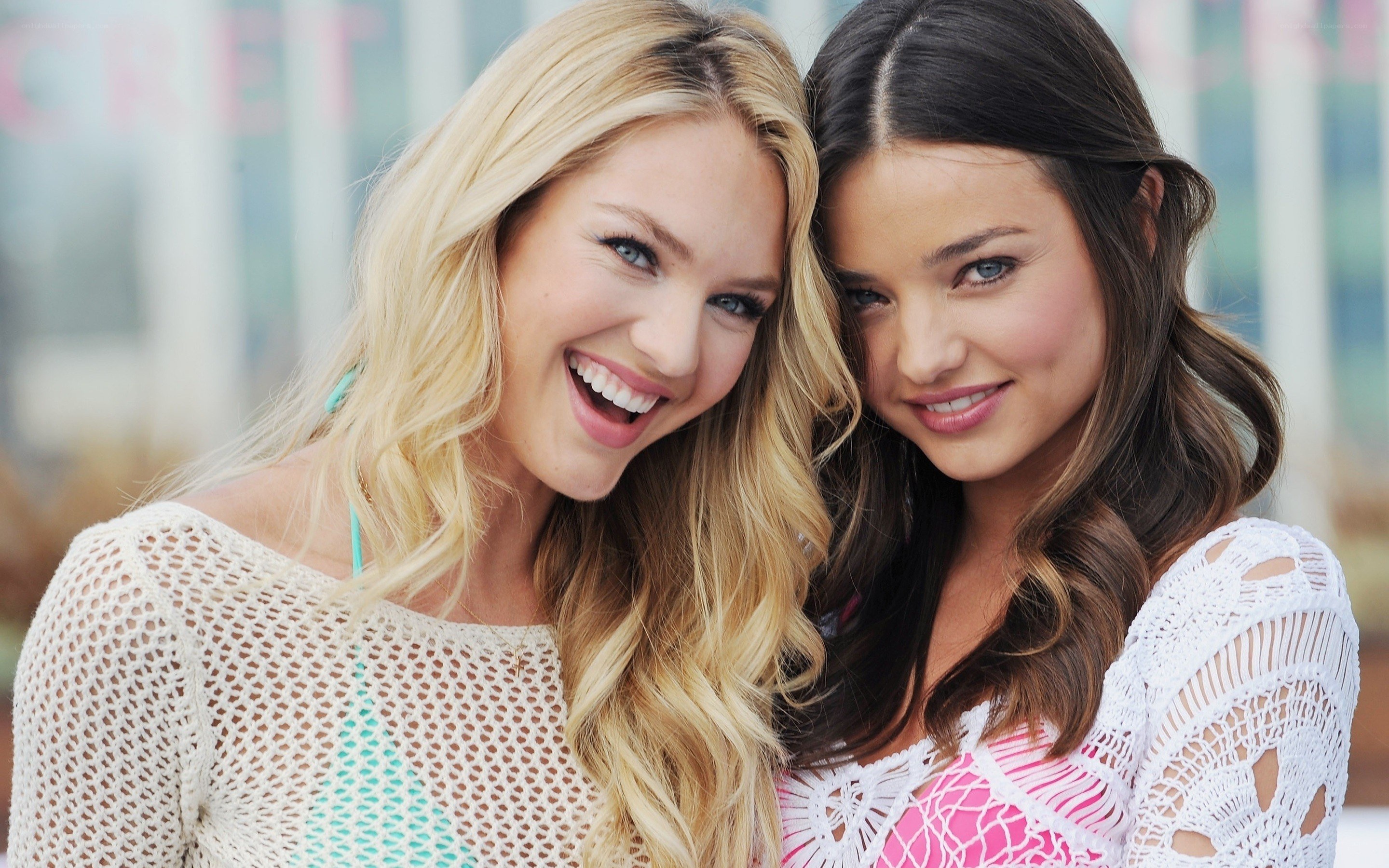 two women smiling together