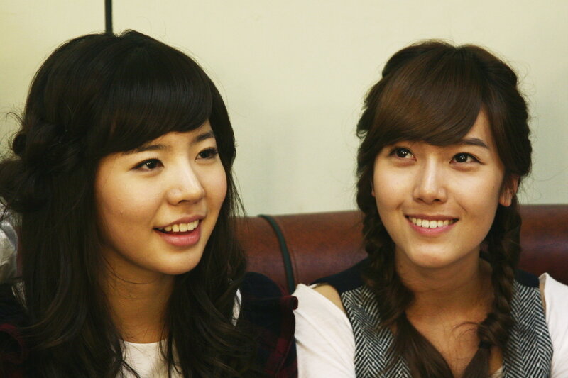 two women smiling together