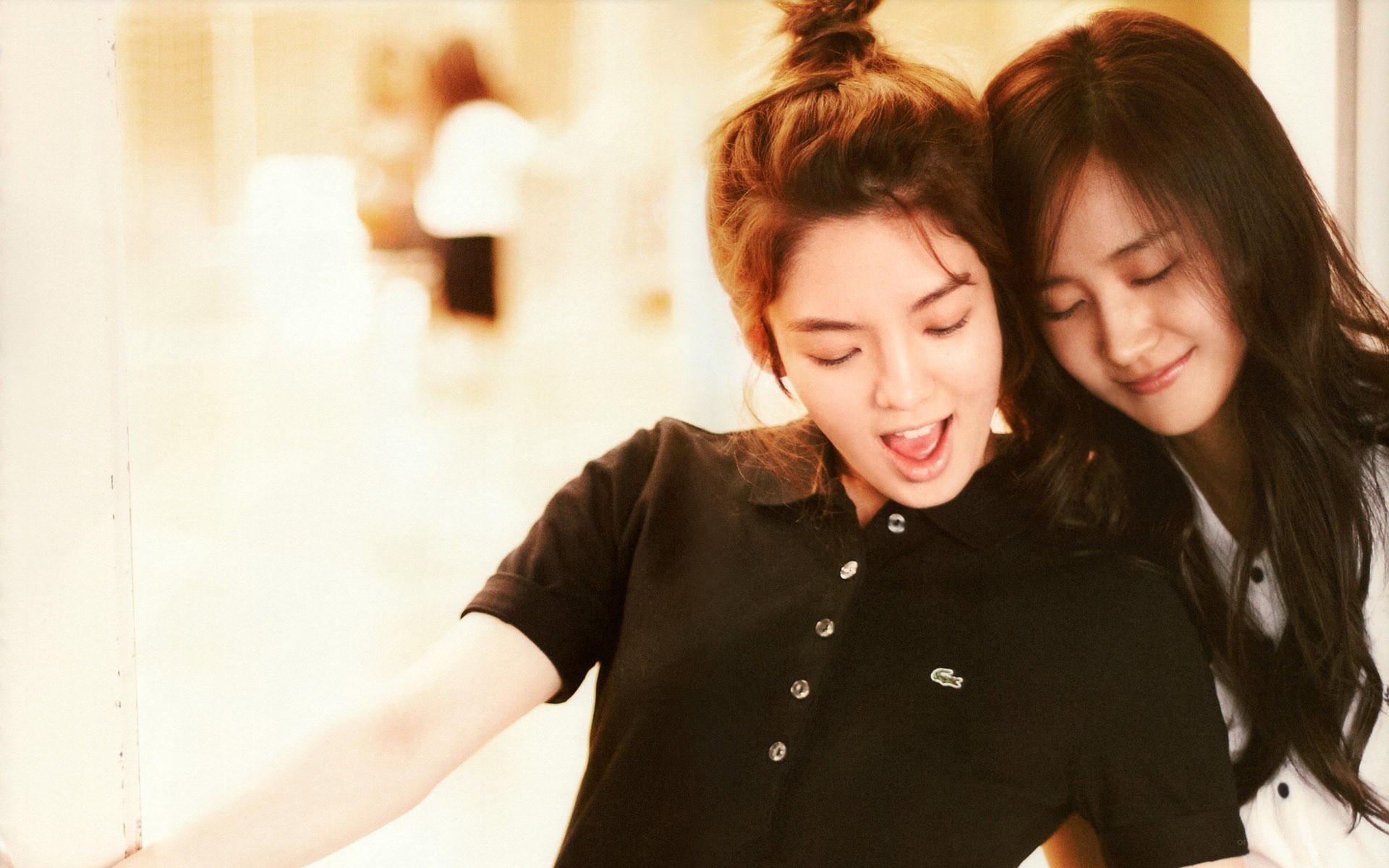 two women smiling together